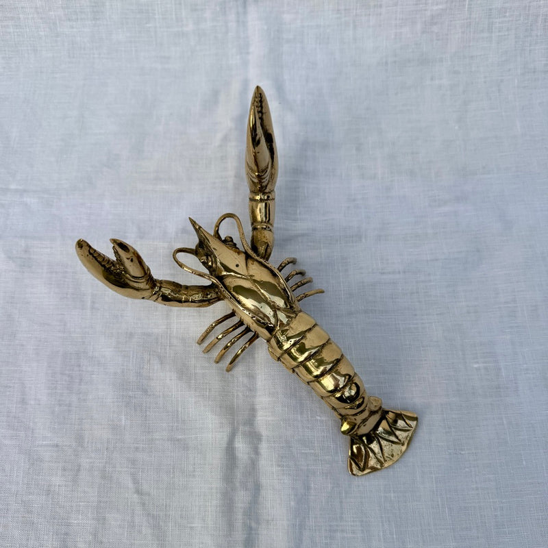 Gaston the brass lobster sculpture