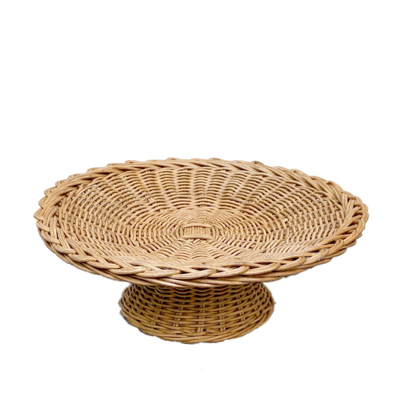 Belanak Pedestal Bowl. Our Belanak Pedestal Bowl is woven by hand by our team of artisans in Java, Indonesia. The rattan has a beautiful warm honey hue and is the perfect addition to any table setting, which can be used in various ways. It's perfect as a bread or fruit bowl but equally nice to display other items such as shells or jewellery. 