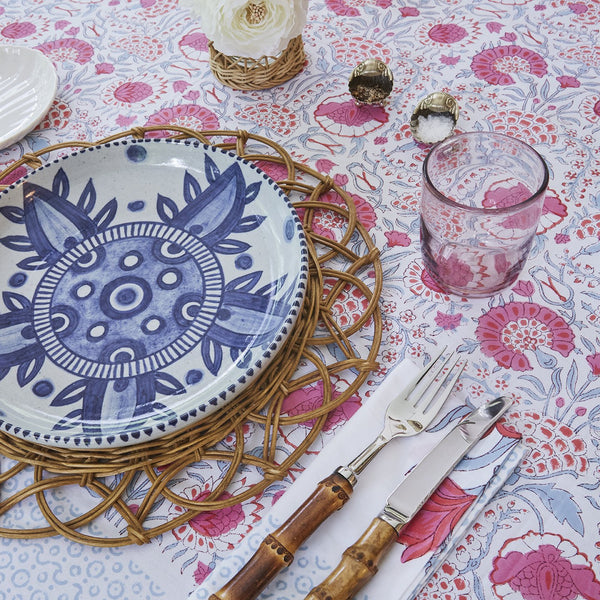 Belanak Wicker Placemat. The Belanak wicker placemats are the perfect addition to any table setting. They are handwoven by our artisans in Java using honey coloured rattan. A very versatile placemat with a tropical touch. 