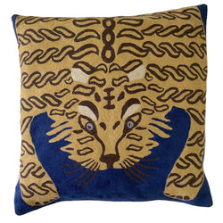 Bengal Tiger Cushion Cover Royal Blue. Each cover is made by hand by skilled artisans in Kashmir, the most northern part of India. Using a technique called chainstitch, colourful pure wool yarn is stitched by hook through cotton. Each cover takes up to a week to make.  We are stocking these beautiful cushion covers in a selection of bold colours in very small quantities. This one is a golden-beige tiger on royal-blue background. 